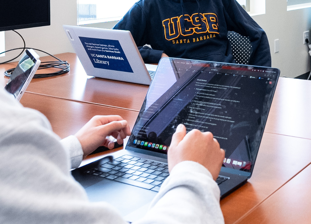 UCSB students working on laptops in a group setting